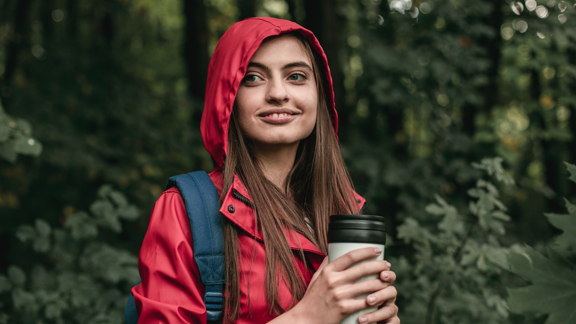 Navigating Change Navigating Change, building your self command muscle - person hiking in a forest while wearing a red raincoat